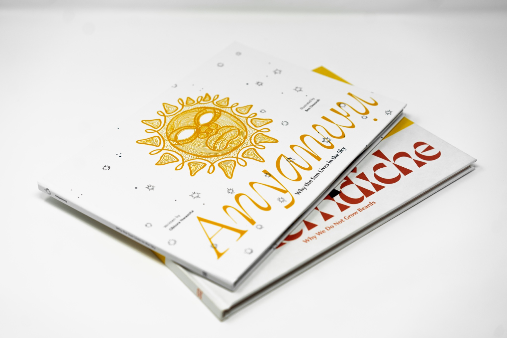 Nkemdiche and Anyanwụ hardcover books together